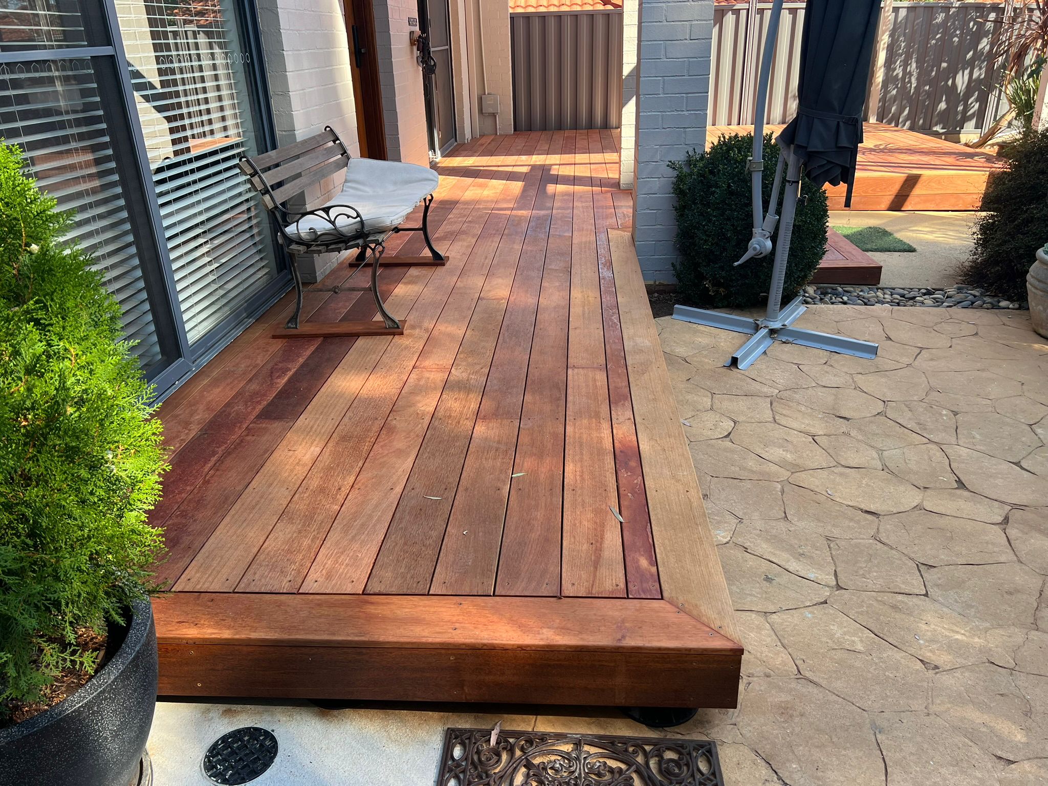 Bruce multi-structure: pergola tied into carport and Merbau deck