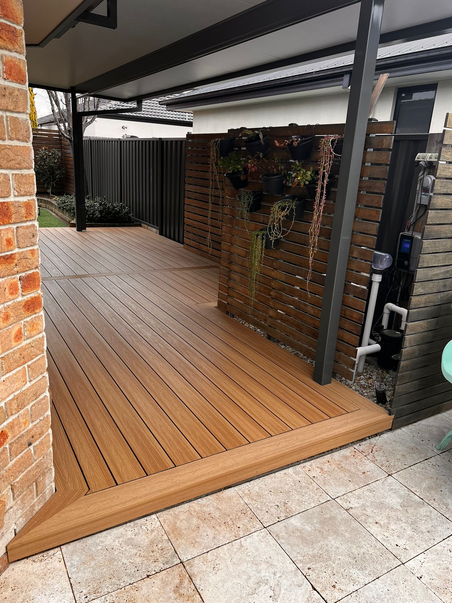 Pergola adjacent to pool with composite deck flooring, McKellar Canberra