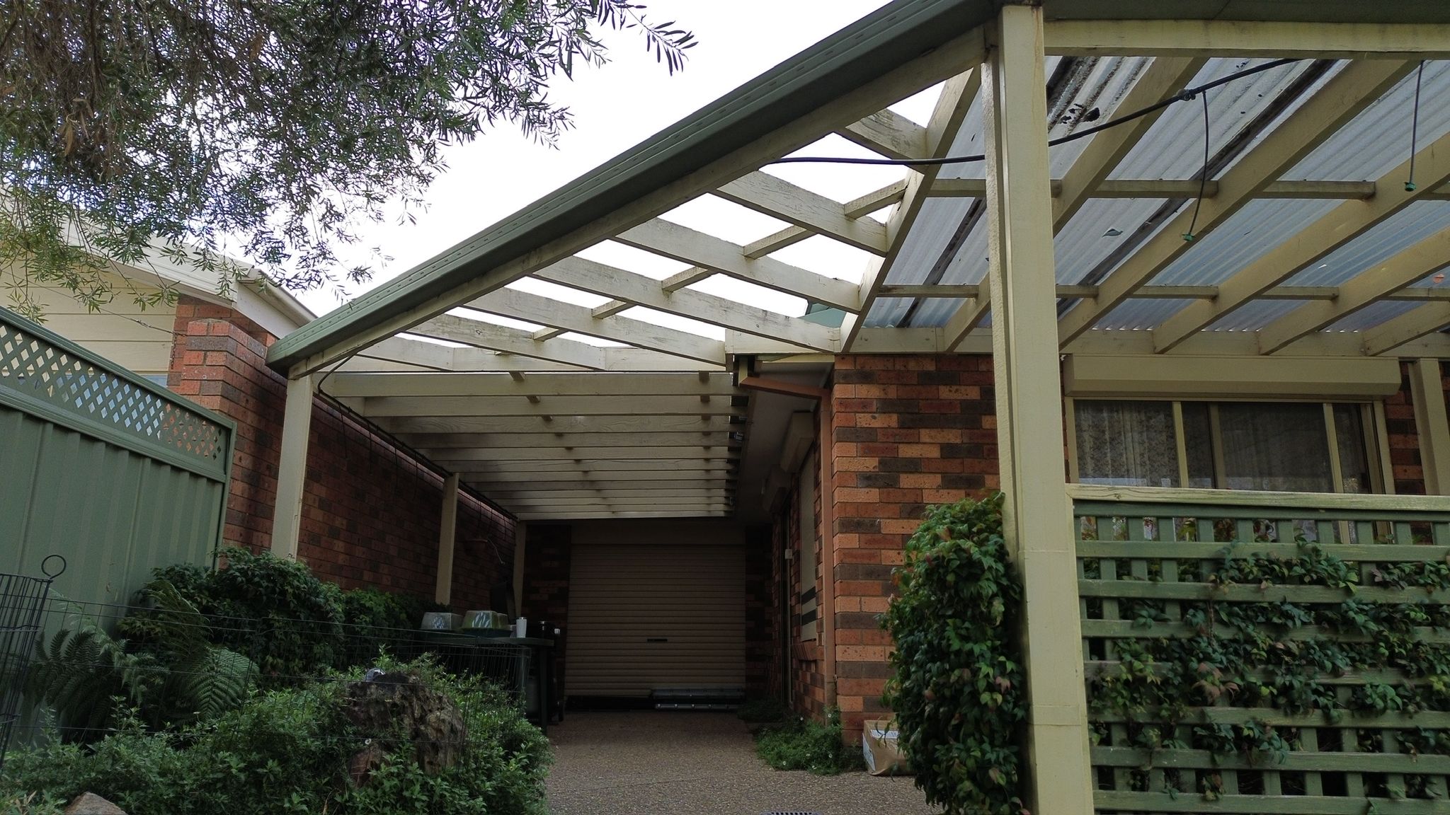 Ngunnawal — wall-fixed carport with receiver channel